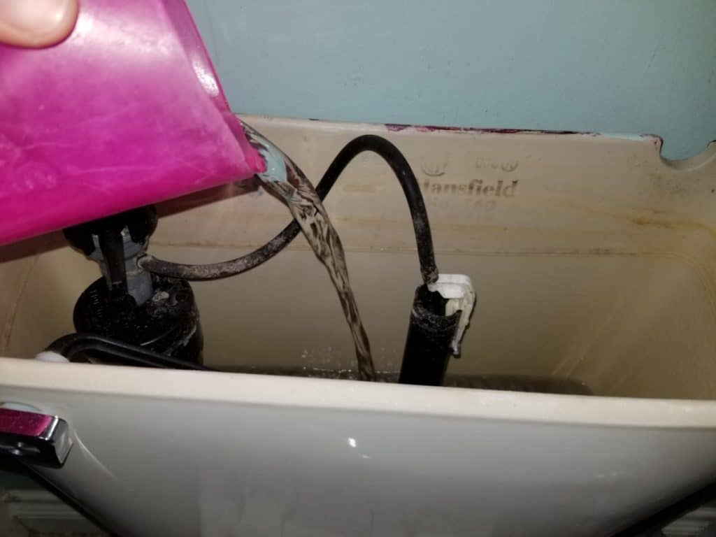 image showing how to manually flush a toilet by filling the reservoir tank during a power outage