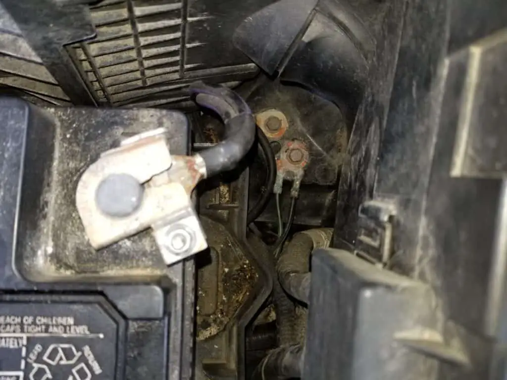 negative terminal of car battery connected to the frame