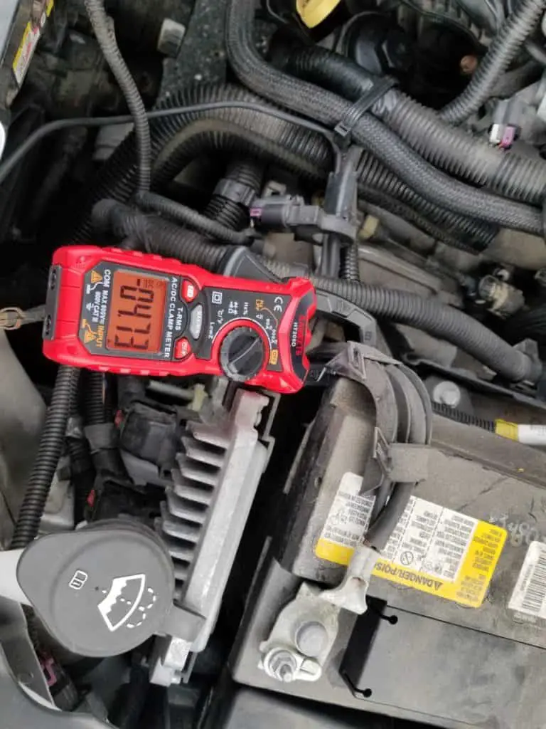 reading amps from car battery while playing radio