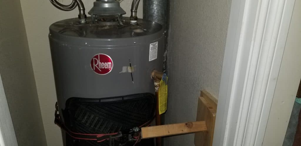 Securing water heater tank so it doesn't spin when removing the anode rod.