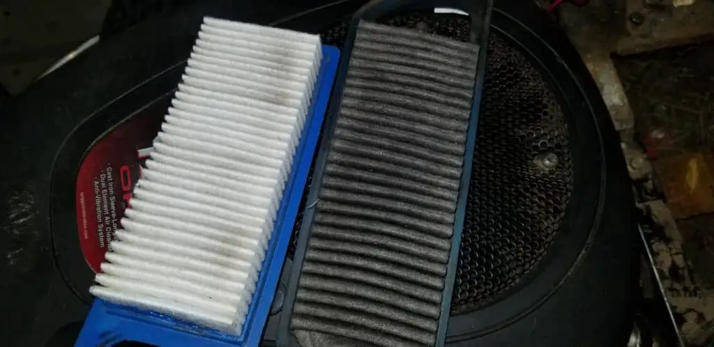 a clogged air filter like the one on the right will cause white smoke