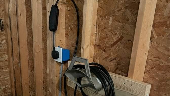 image of my garage with a Tesla EVSE for Level 2 charging speeds at 240-volts.