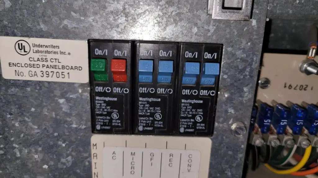 Image showing the circuit breakers inside an RV that might be tripped