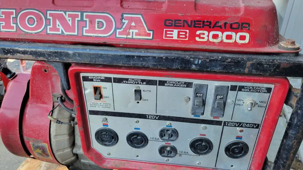 Image of a generator's circuit breaker and receptacles.