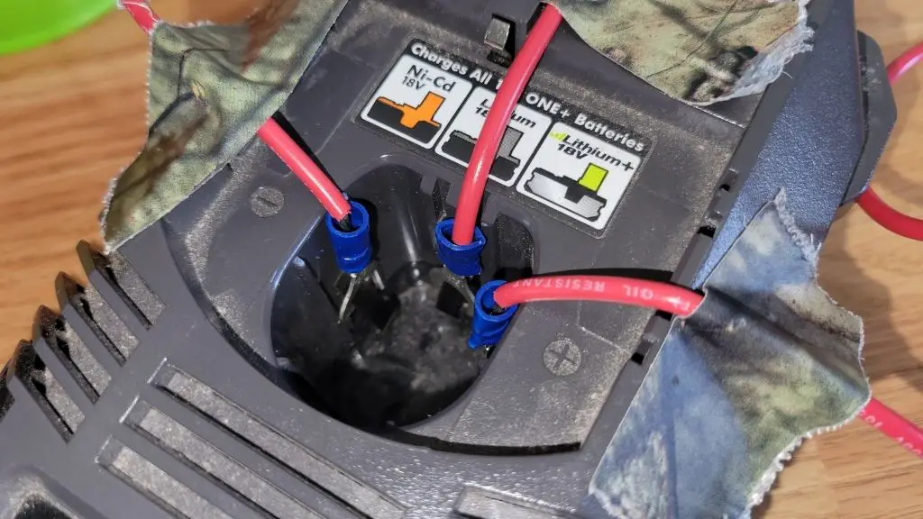 Image showing how to attach wires to a Ryobi battery charger to bypass the control module.