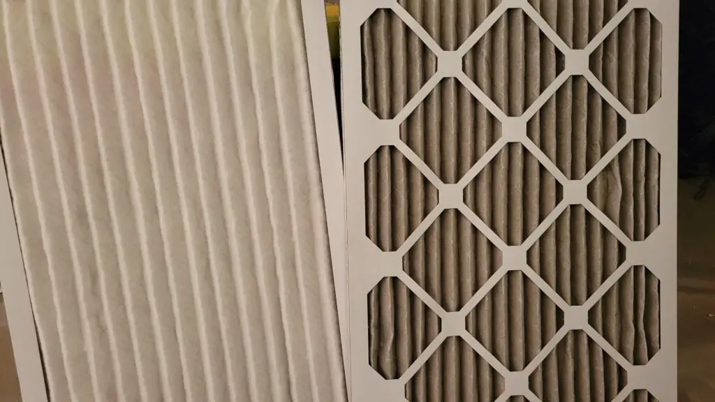 image comparing what a clean and dirty furnace filter look like.