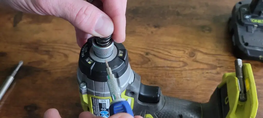 image showing the ryobi impact driver taken apart safely and successfully