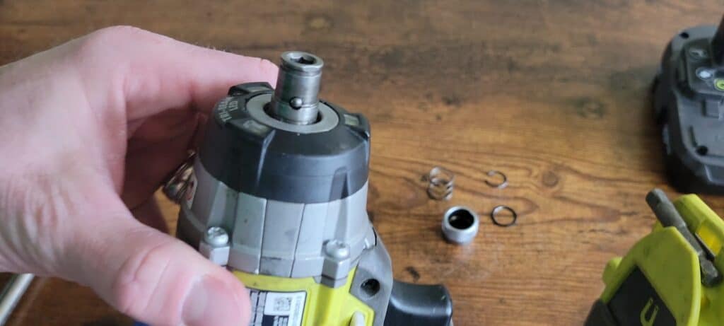 image showing all of the disassembled parts of a ryobi impact driver